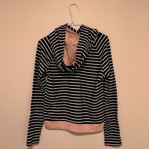 Black & white striped hoodie with touches of pink, lightly worn, women’s size M